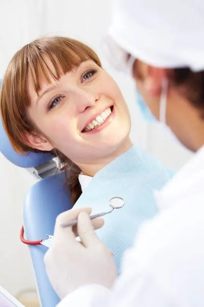 patient smiling during her periodontal appointment at Parkview Family Dentistry